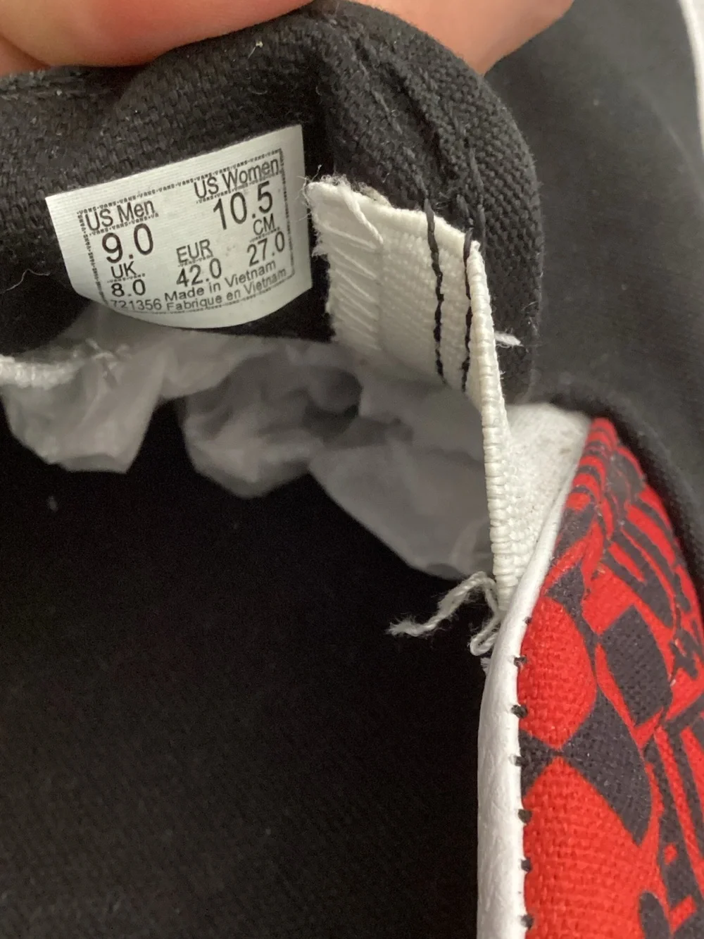Vans Black Slip-On Loafers with Red and Orange Patterned Collar